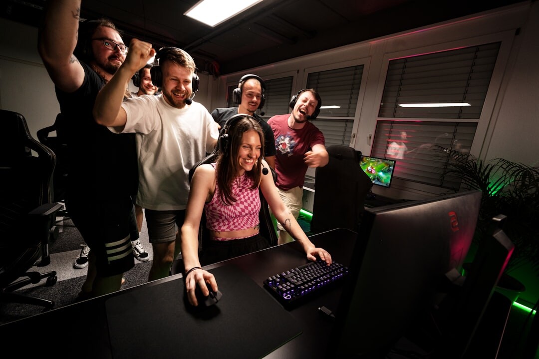 Journalists celebrating together in a modern newsroom